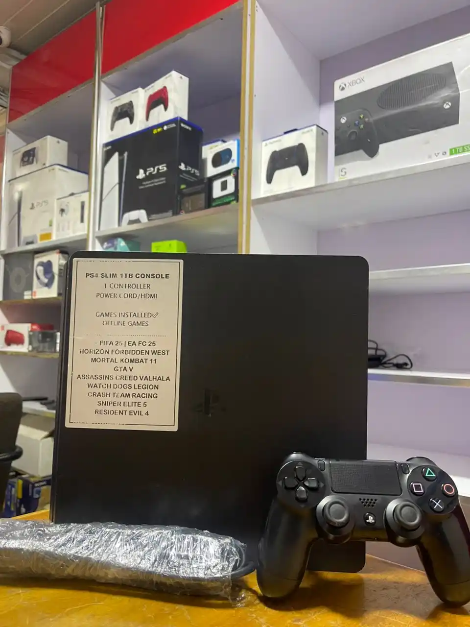 Image from AUGUST CHANNEL 💻📲🎧🎮🛜📺: 🎮🔥 Get Your Ultimate PS4 SLIM 1TB Bundle! 🔥🎮 💰 Price: ₵3,300 onl...