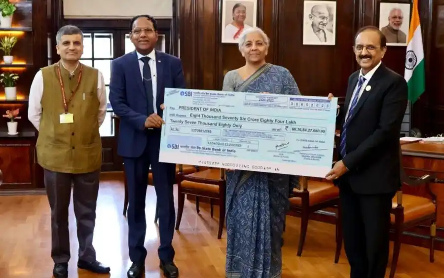 Image from NDTV Profit: *GOI GETS BUMPER DIVIDEND* Finance Minister Nirmala Sitharaman receiv...
