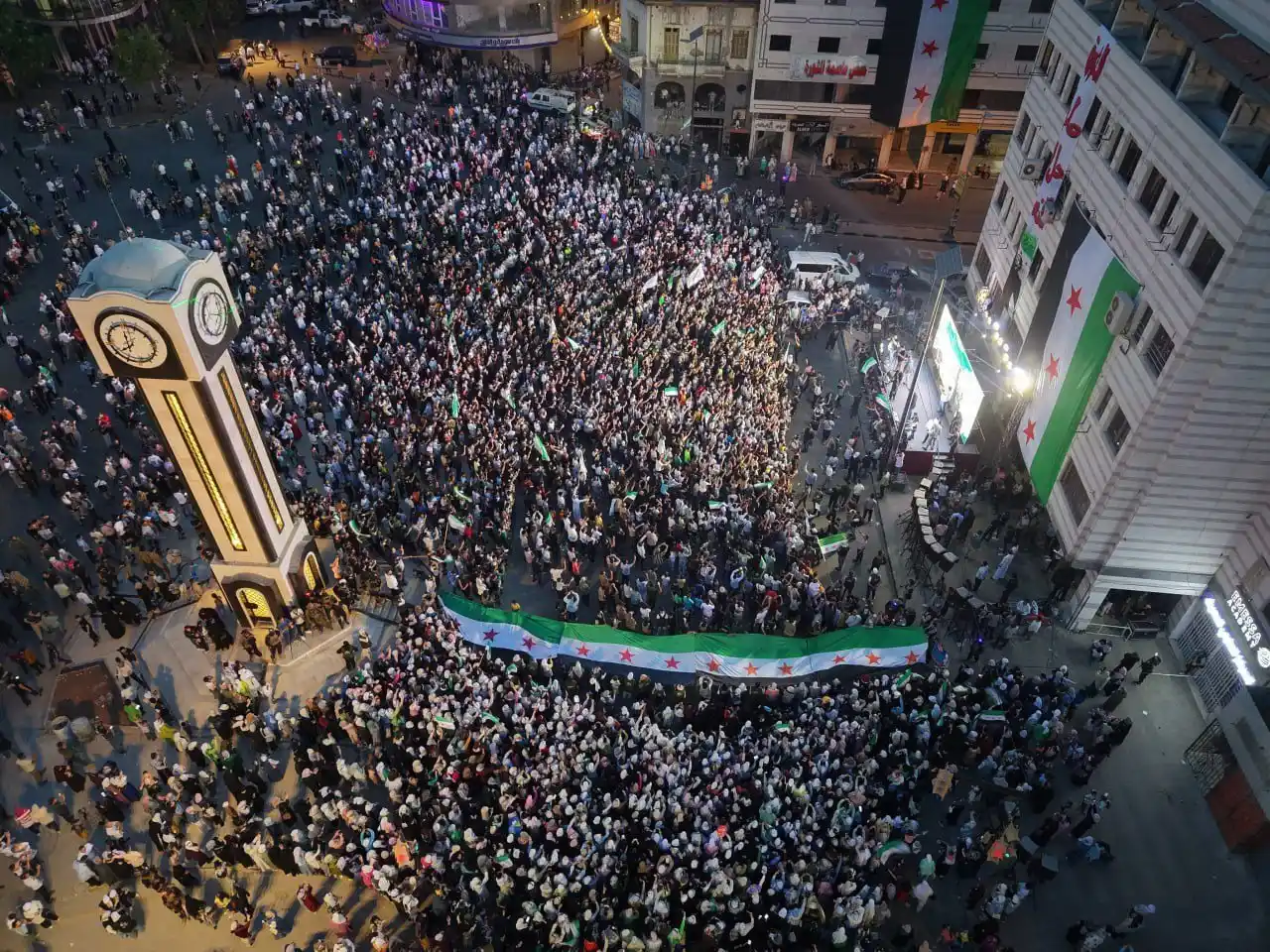 Image from SANA en Español : Por primera vez desde la liberación, los residentes de Homs conmemoran...