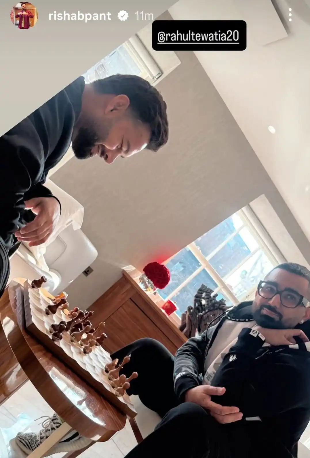 Image from Cricadium🏏: Rishabh Pant playing chess with Rahul Tewatia.  <a class="text-blue-50...