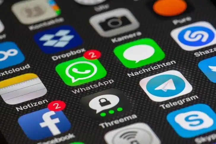 Image from The Voice Online News: *WhatsApp's new feature might be a gift to con artists* ______________...