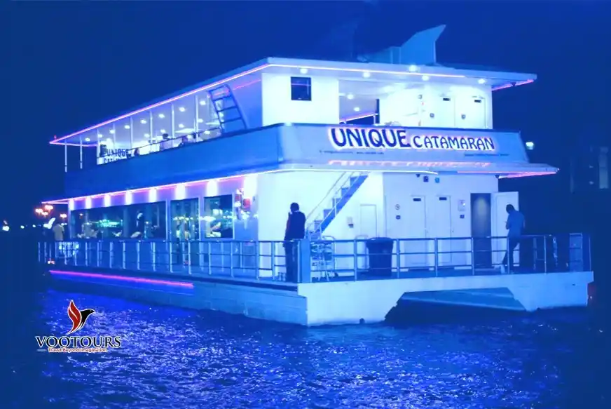 Image from Vootours Tourism : Sail into the night with a magical Catamaran Dinner Cruise in Dubai Ma...
