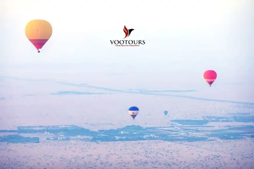 Image from Vootours Tourism : Watch the golden dunes awaken with light as you soar through the skies...