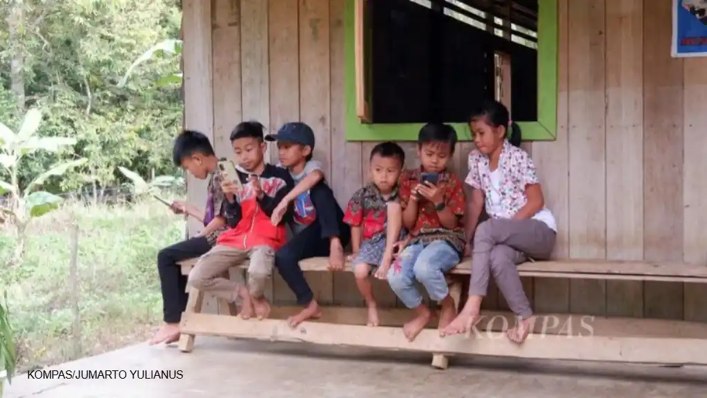Image from Harian Kompas (Kompas.id): *“Screen Time” Berlebihan Memicu Masalah Emosional Anak* Di era digit...