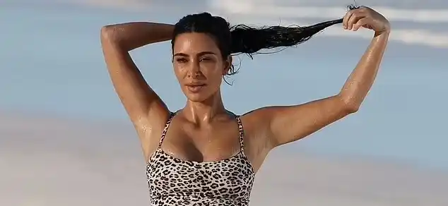 Image from Daily Mail | Kardashians News: Kim Kardashian oils up her sculpted bikini body for sexy shoot 😍 See...