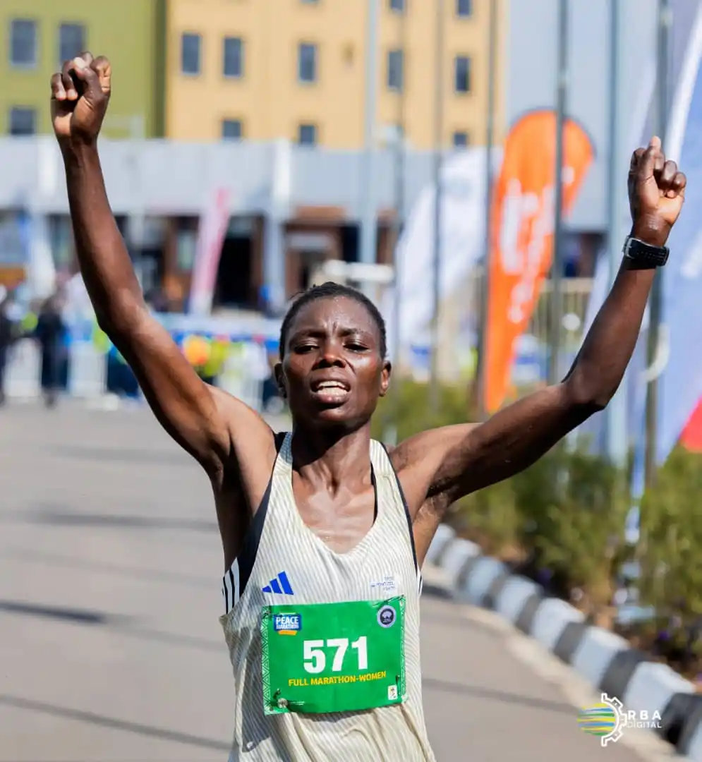 Image from Rwanda Broadcasting Agency (RBA): BREAKING: Kenya’s Teresia Kwamboka Omosa wins the Women’s Full Marat...