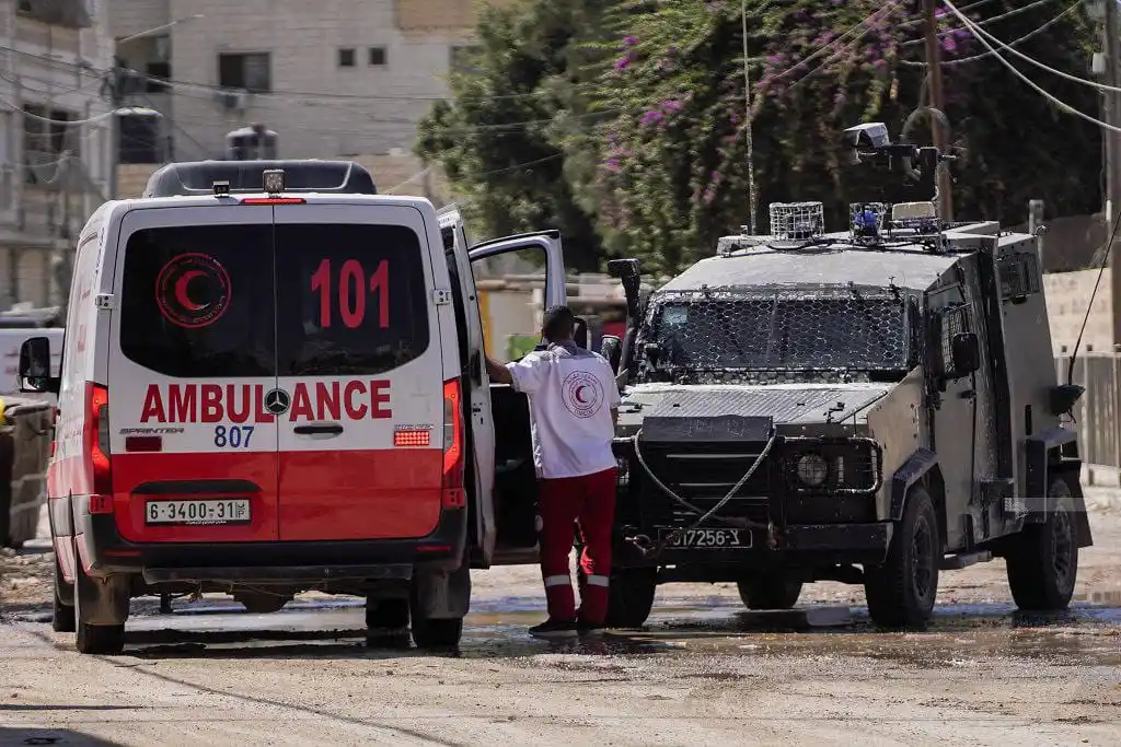 Image from Quds News Network: The Palestine Red Crescent Society (PRCS) reports that its teams opera...