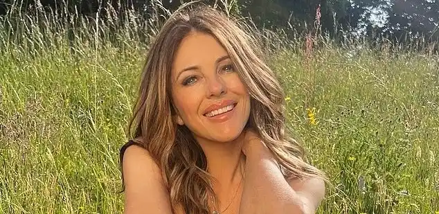 Image from Daily Mail: Elizabeth Hurley leaves little to the imagination as she poses NAKED t...