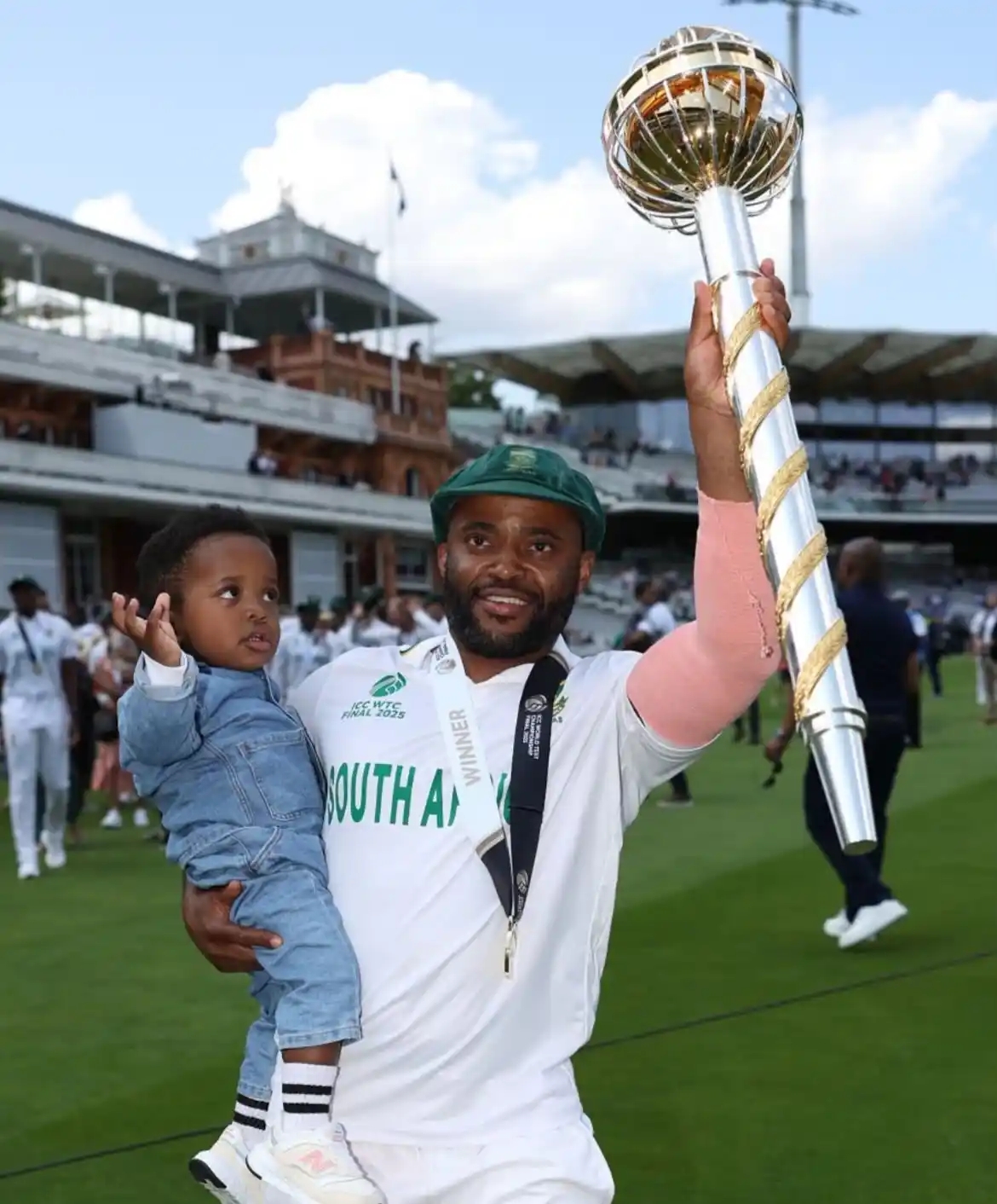 Image from Cricadium🏏: Temba Bavuma sharing the moment with his son and the Test Mace — this ...