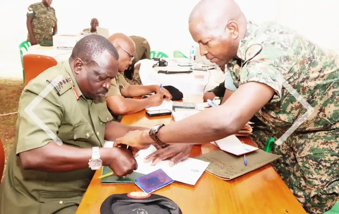 Image from The Crown Media East Africa: *UPDF Salutes Seven Generals as They Prepare for Retirement* Crown Med...
