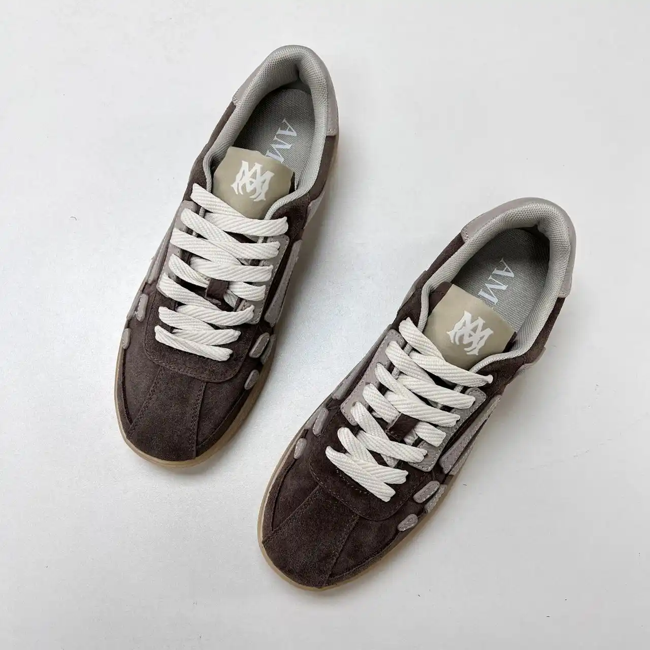 Image from Newkick: Artisanal edge meets quiet luxury. ✨ AMIRI SKEL TOP LOW in COFFEE/BEIG...