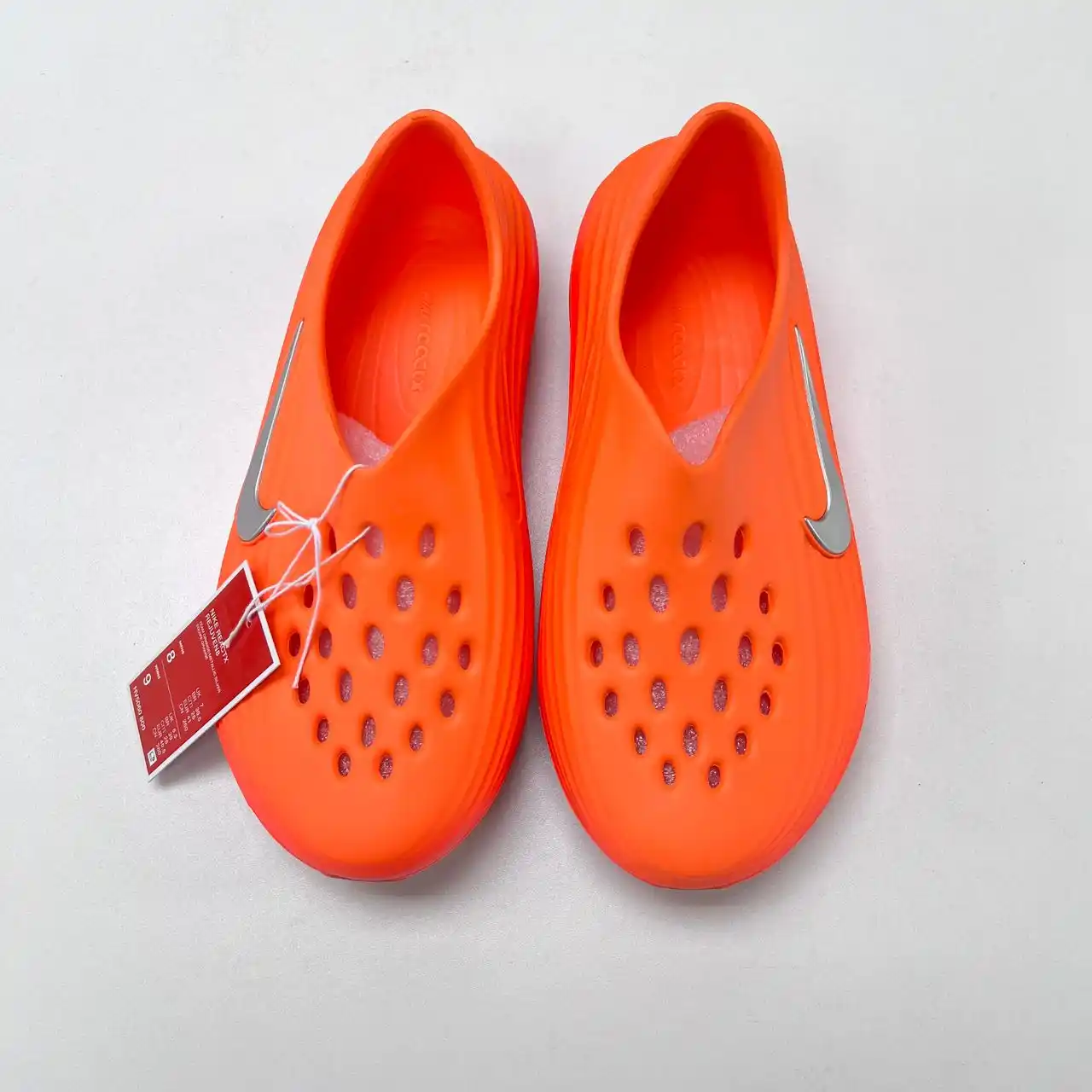 Image from Newkick: Stand out in FIRE & ICE! ✨ NIKE REACTX REJUVE8 - TEAM ORANGE/METALLIC ...