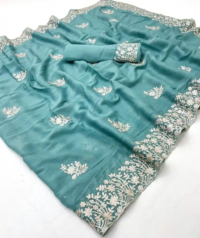 Image from Wholetex Sarees Catalog & Singles: https://www.wholetex.com/wholesale-catalogs/star-city-fancy-georgette-...
