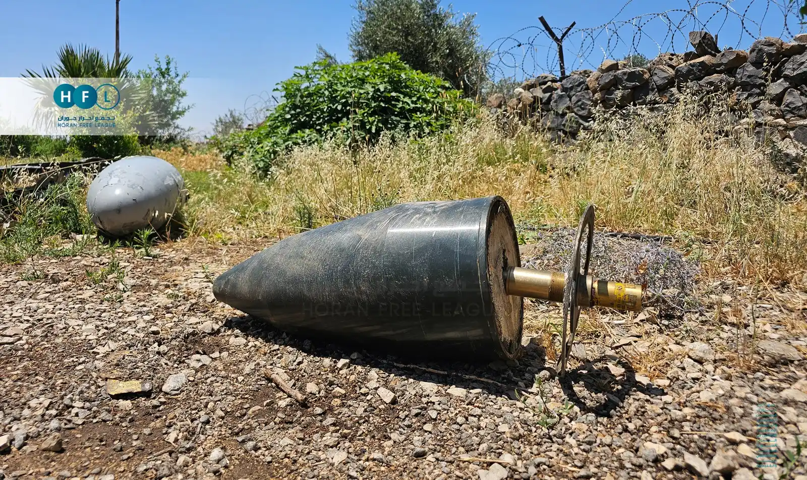 Image from تجمع أحرار حوران: بقايا طائرة مسيرة فجرتها الدفاعات الجوية الإسرائيلية في قرية صيدا الجو...