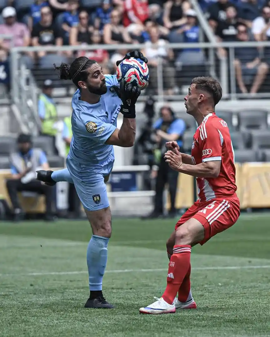 Image from Sportdailytv: Auckland City goalkeeper Conor Tracey works in a supervisory role at a...