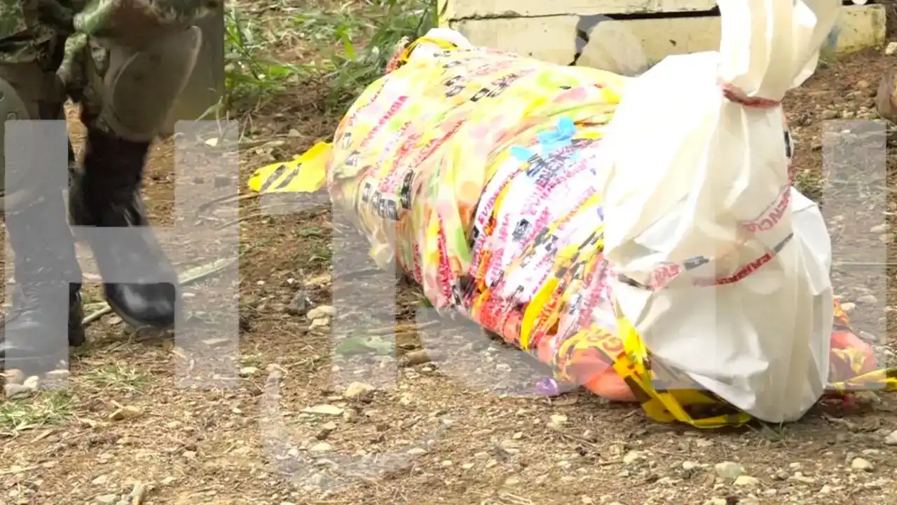 Image from Hora 13 Noticias: *Hallan cuerpo sin identificar envuelto en sábanas en El Popular: el h...