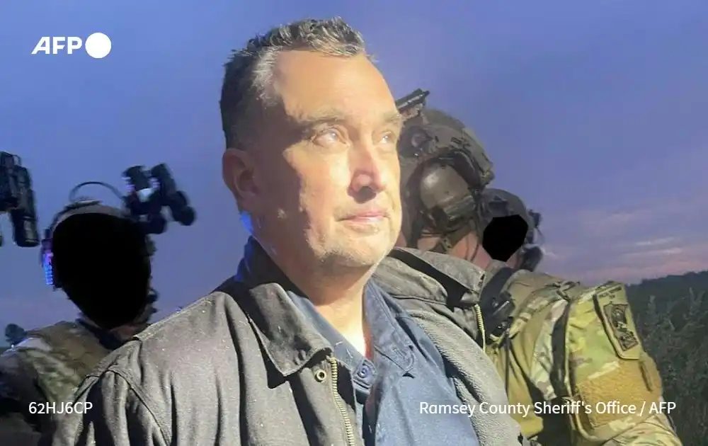 Image from AFP News: 2️⃣ *US law enforcement* officials in *Minnesota* caught the *suspecte...