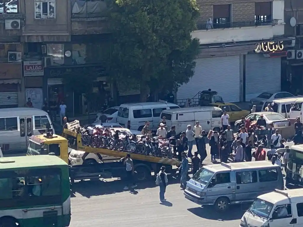 Image from أخبار العالم لحظة بلحظة: 🔴دمشق حملة مصادرة الدراجات النارية...