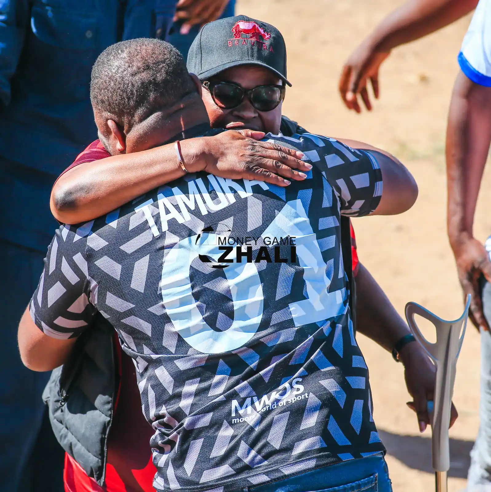 Image from Money Game Zhali: Mwos FC owner Patrick Tamson and the Minister of State for Mashonaland...