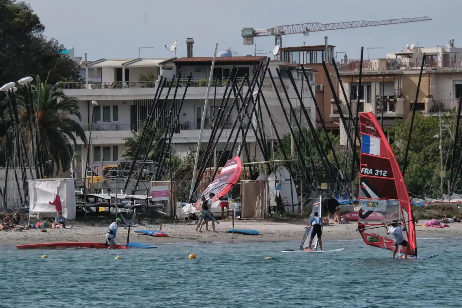 Image from L'Unione Sarda: *Bullismo, sospesi i vertici del Windsurfing club di Cagliari*  Le san...