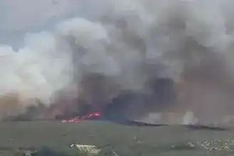 Image from L'Unione Sarda: *L’incendio minaccia le case a San Giovanni Suergiu: scatta l’evacuazi...
