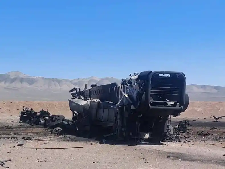 Image from Global News: שרידים חרוכים של משגר (TEL) לטיל בליסטי, ככל הנראה טיל בליסטי לטווח בי...