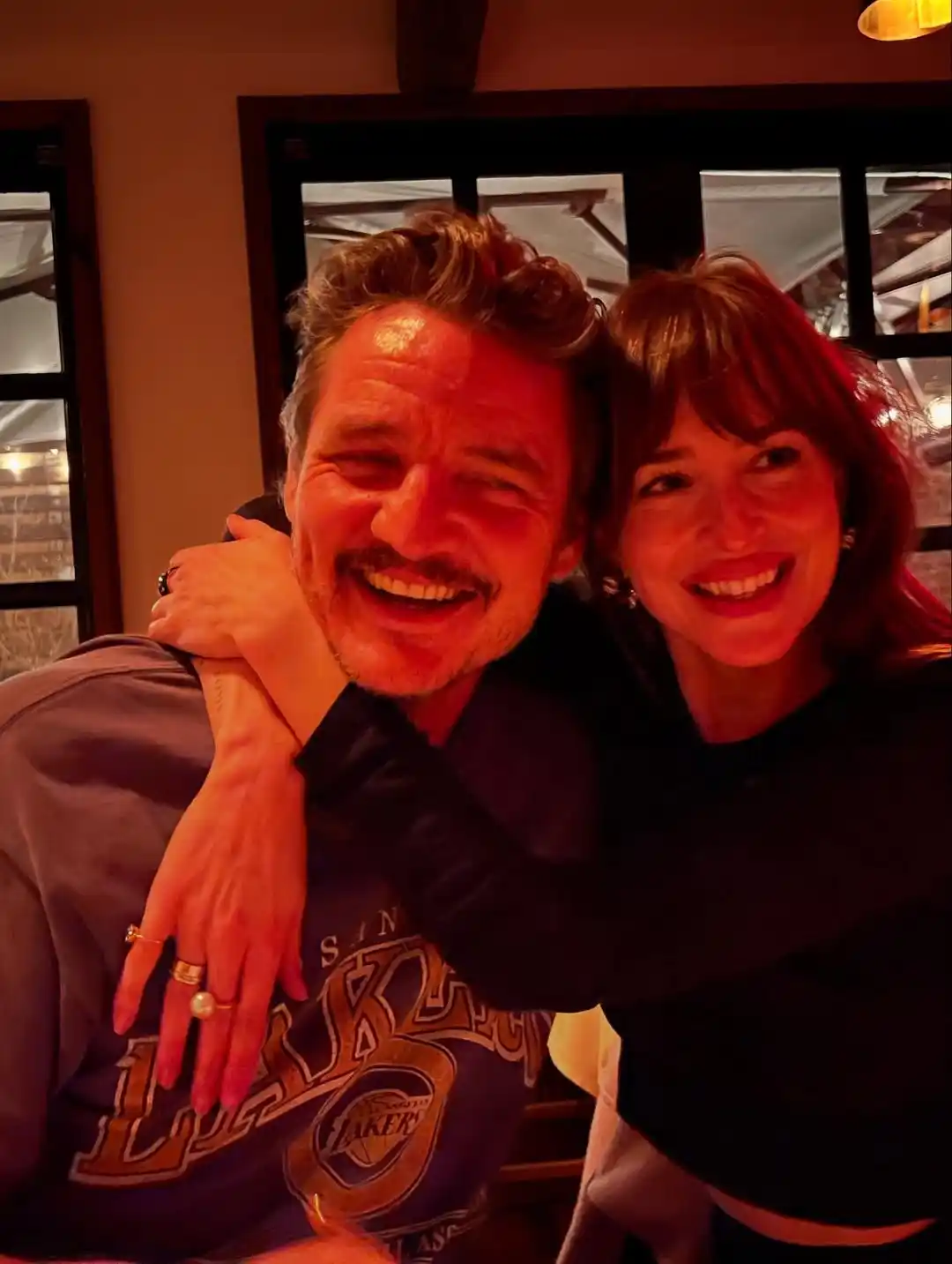 Image from Rolling Stone: Pedro Pascal and Dakota Johnson behind-the-scenes of 'Materialists.'...