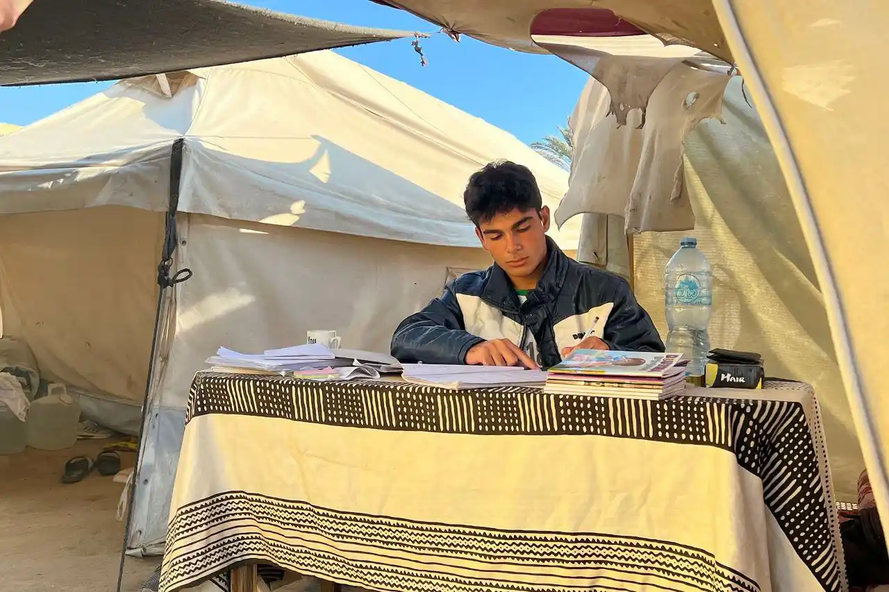 Image from Quds News Network: In official exam season, students in Gaza are deprived of their educat...