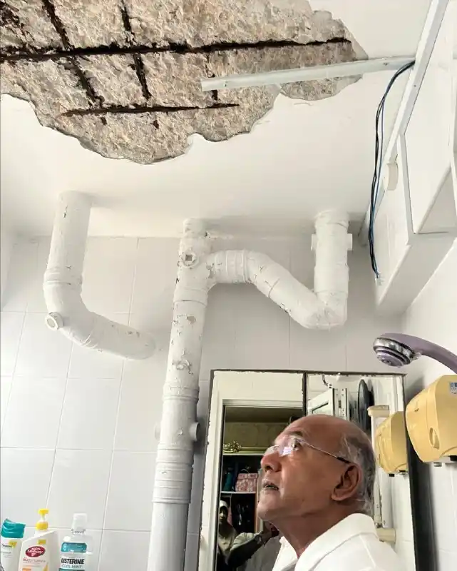 Image from CNA: A 65-year-old man was taken to hospital after spalling concrete fell i...