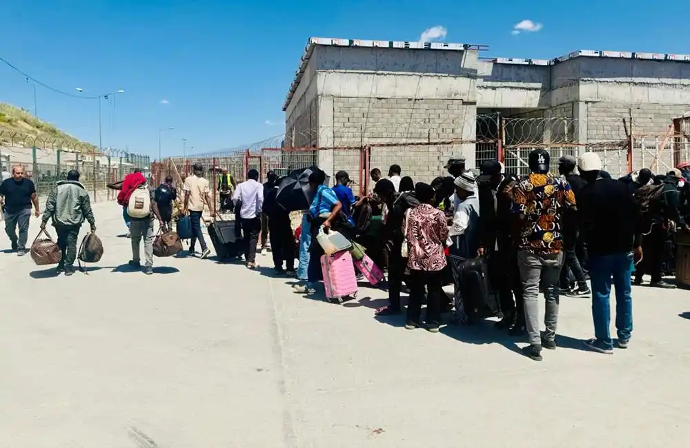 Image from The New Vision: A total of 45 Ugandans evacuated from war-torn Iran on Friday checked ...