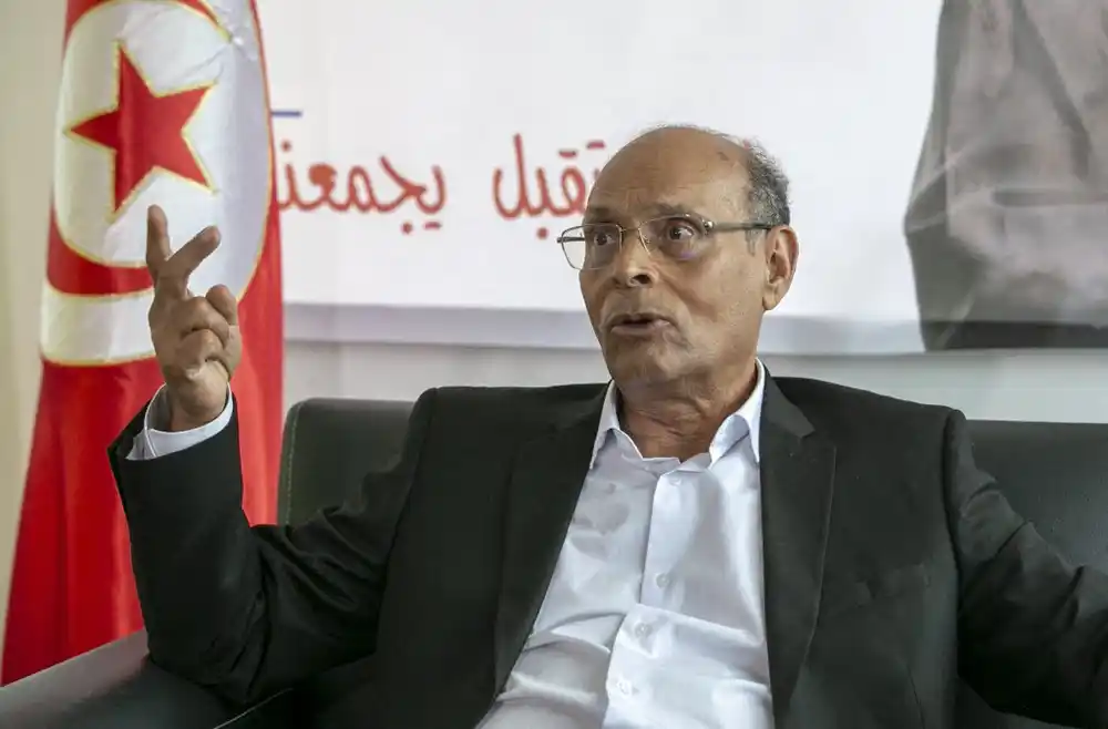 Image from The New Vision: A Tunis court has sentenced exiled former president Moncef Marzouki in...