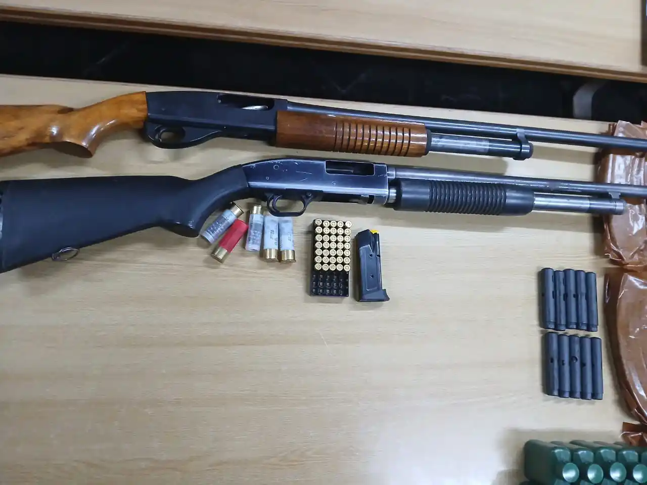 Image from CrimeWatch : 10 AK-47 RIFLES SEIZED AND THREE ARRESTED IN PORT ST JOHN'S RAID  A co...
