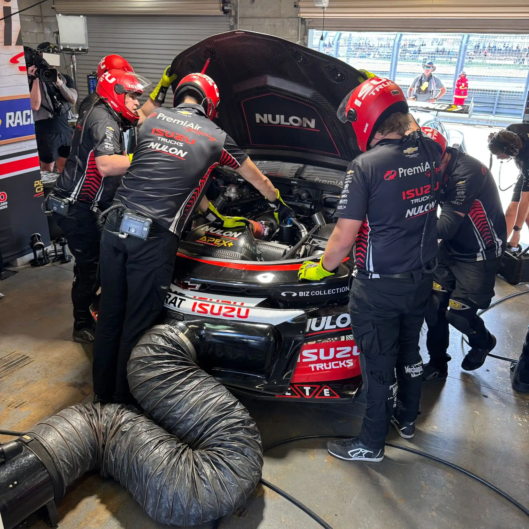 Image from Premiair Racing Live Feed: Team’s hard at it in the garage, chasing the power steering pressure i...