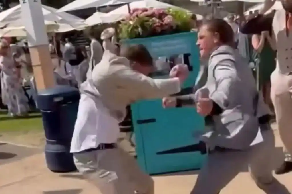 Image from The Mirror: *Moment Royal Ascot racegoers in suits throw punches as violent brawl ...