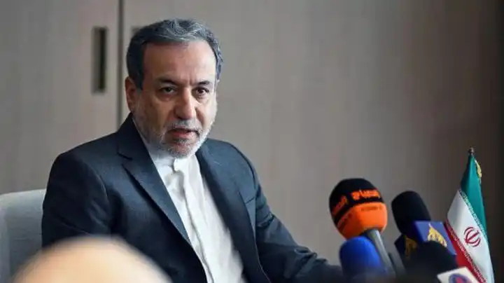 Image from Quds News Network: Iranian Foreign Minister Abbas Araghchi: "The United States is fully r...