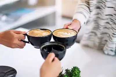 Image from NDTV Profit: *BITTER SWEET NEWS* Your morning coffee just got cheaper, but trouble...
